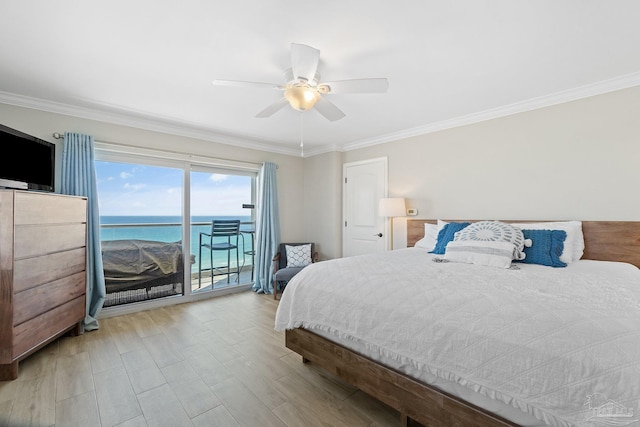 bedroom with access to exterior, light hardwood / wood-style flooring, ornamental molding, and a water view