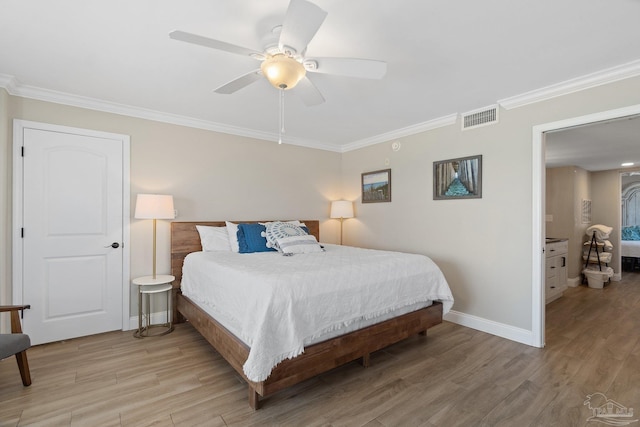 bedroom with crown molding, light wood-type flooring, and ceiling fan