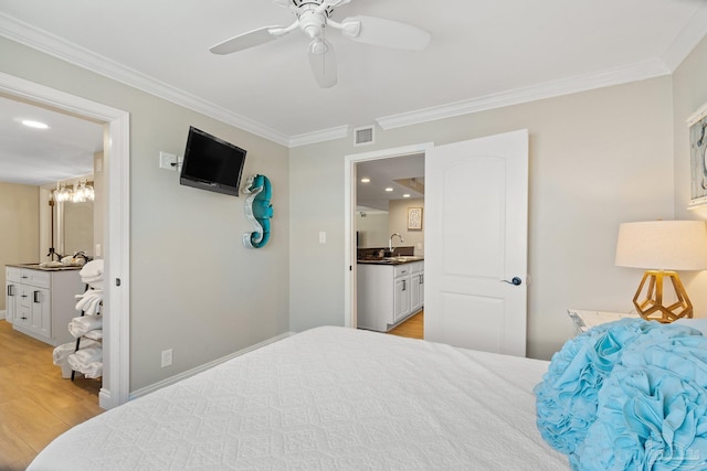 bedroom with sink, ensuite bath, light hardwood / wood-style flooring, ceiling fan, and ornamental molding