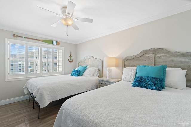 bedroom featuring crown molding, ceiling fan, and wood-type flooring