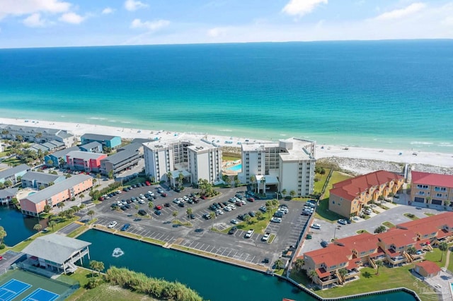 aerial view featuring a water view and a beach view