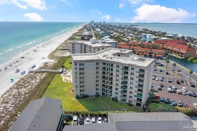 aerial view featuring a water view and a beach view