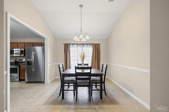 5661 Maggie Rose Cir, Milton, FL 32570 - dining room featuring a chandelier, lofted ceiling, and light tile patterned flooring