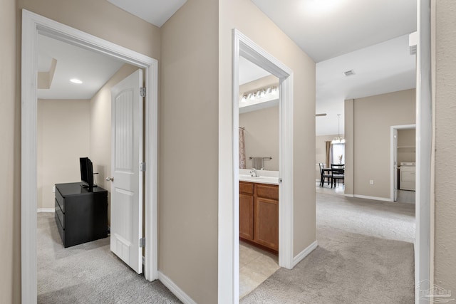 5661 Maggie Rose Cir, Milton, FL 32570 - hallway featuring light colored carpet