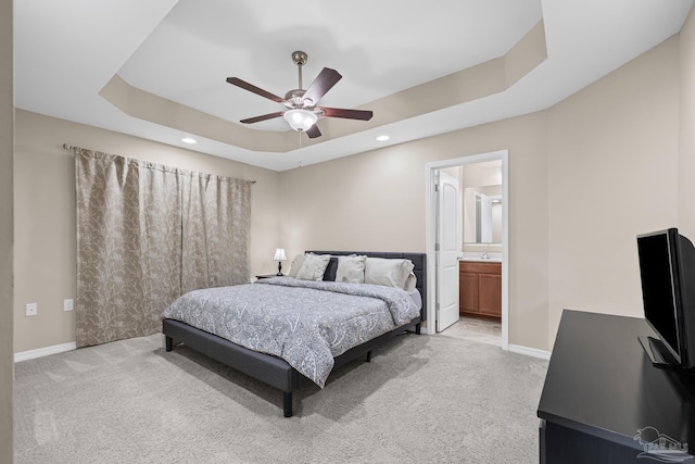 5661 Maggie Rose Cir, Milton, FL 32570 - bedroom with light colored carpet, recessed lighting, a raised ceiling, ceiling fan, and ensuite bath