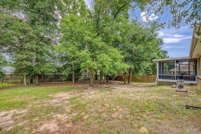 5661 Maggie Rose Cir, Milton, FL 32570 - view of yard featuring a sunroom