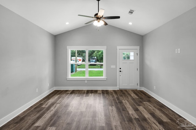 entrance foyer featuring dark wood-style floors, plenty of natural light, baseboards, and visible vents