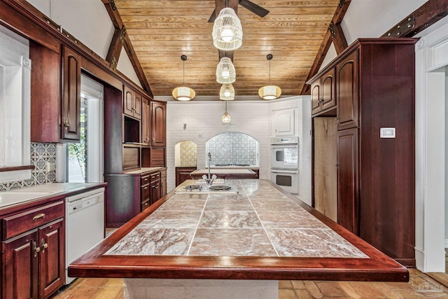 kitchen with pendant lighting, an island with sink, lofted ceiling, wood ceiling, and white appliances