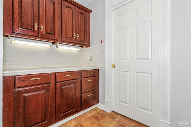 kitchen featuring tile countertops