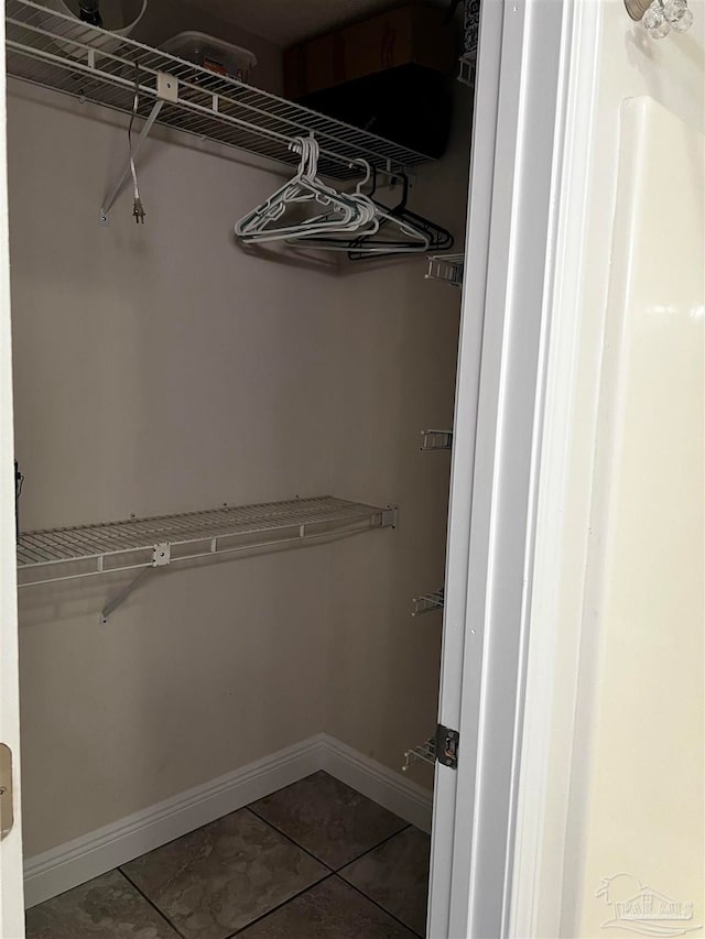 walk in closet featuring tile patterned floors