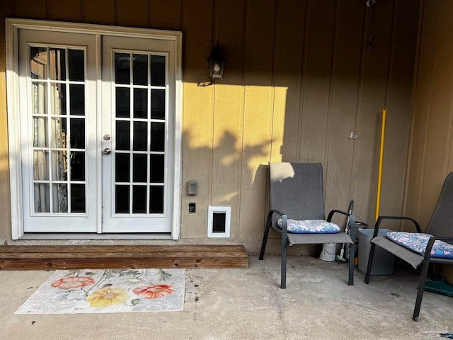 property entrance featuring french doors