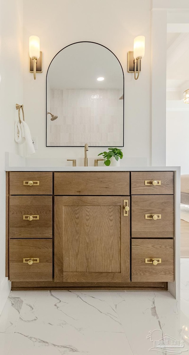 bathroom featuring vanity and a shower