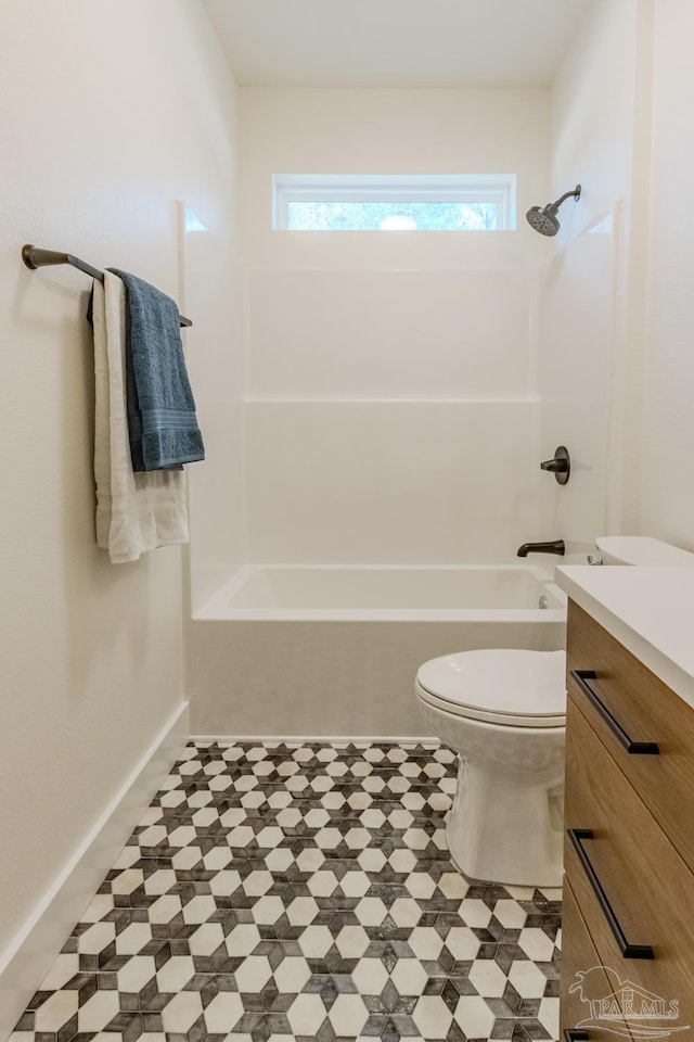 full bathroom with vanity, bathing tub / shower combination, and toilet