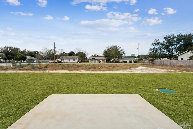 view of yard with a patio area and fence