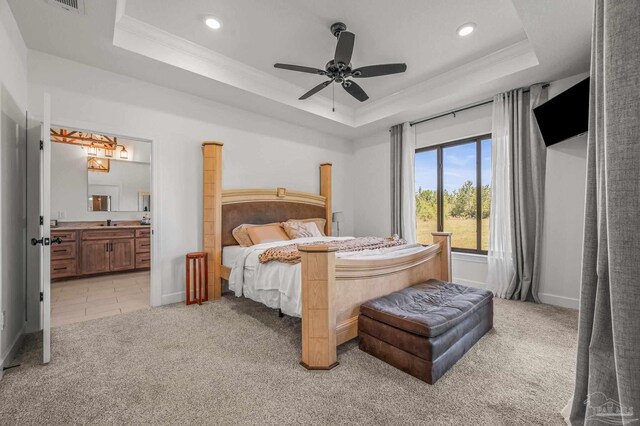 3720 Arbor Ridge Rd, Pace, FL 32571 - bedroom with crown molding, light colored carpet, recessed lighting, a tray ceiling, and ensuite bath