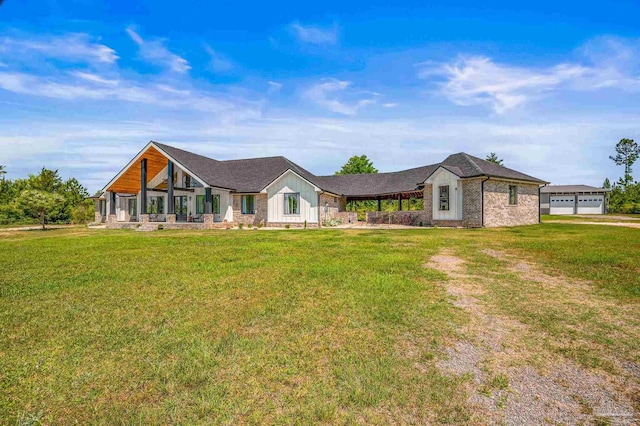 3720 Arbor Ridge Rd, Pace, FL 32571 - view of front facade featuring board and batten siding and a front yard