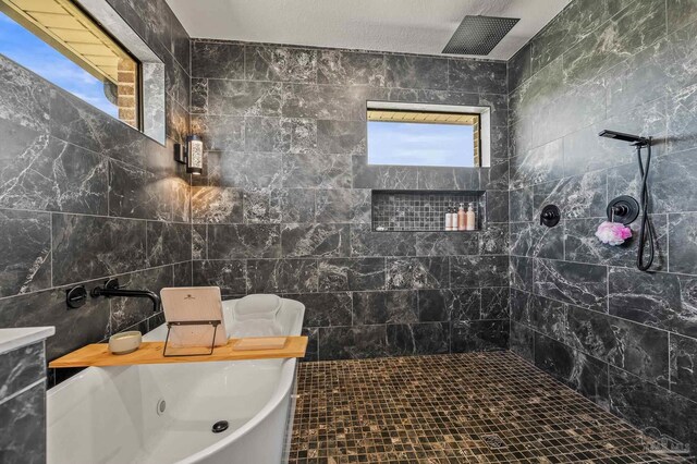 3720 Arbor Ridge Rd, Pace, FL 32571 - full bathroom with a tub, visible vents, and a tile shower
