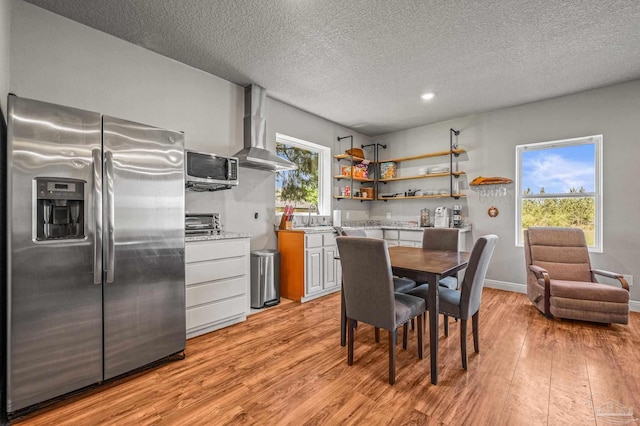 3720 Arbor Ridge Rd, Pace, FL 32571 - dining room featuring recessed lighting, baseboards, light wood finished floors, and a textured ceiling