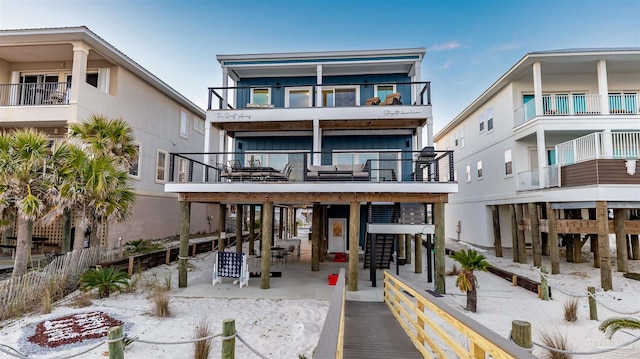 back of house with a balcony