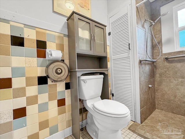 1007 W Wright St, Pensacola, FL 32501 - full bath with toilet, tile patterned floors, and a shower stall