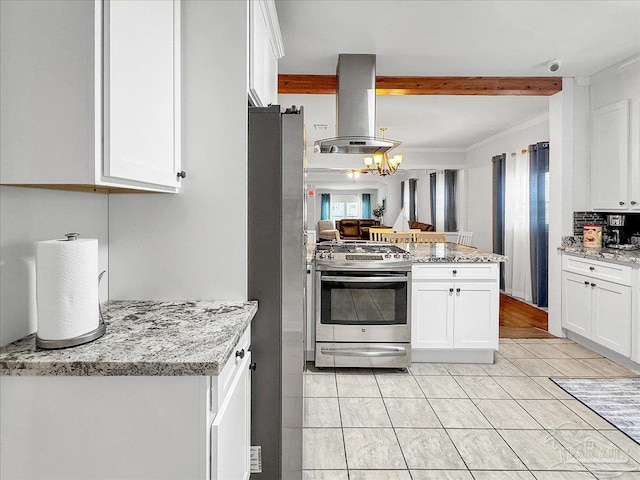 1007 W Wright St, Pensacola, FL 32501 - kitchen with a chandelier, white cabinetry, stainless steel appliances, island exhaust hood, and ornamental molding