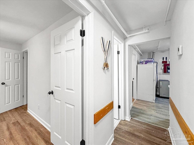 1007 W Wright St, Pensacola, FL 32501 - hall featuring baseboards and wood finished floors