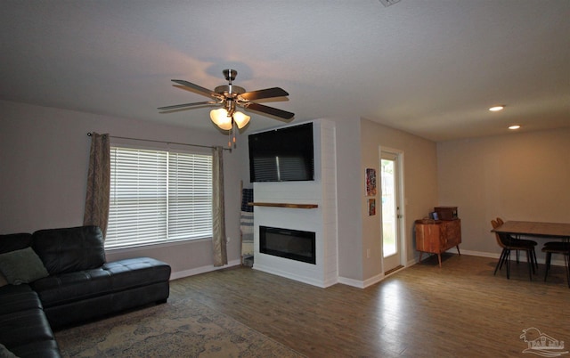 9453 Lutoo Ln, Pensacola, FL 32526 - living room with wood finished floors, baseboards, a ceiling fan, and recessed lighting