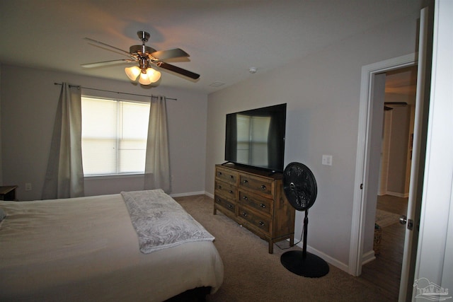 9453 Lutoo Ln, Pensacola, FL 32526 - bedroom featuring light colored carpet, baseboards, and a ceiling fan