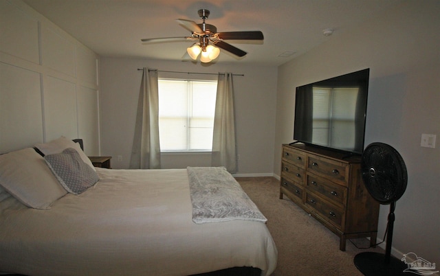 9453 Lutoo Ln, Pensacola, FL 32526 - bedroom with light colored carpet, a ceiling fan, and baseboards