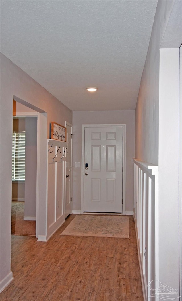 9453 Lutoo Ln, Pensacola, FL 32526 - entryway featuring wood finished floors and baseboards