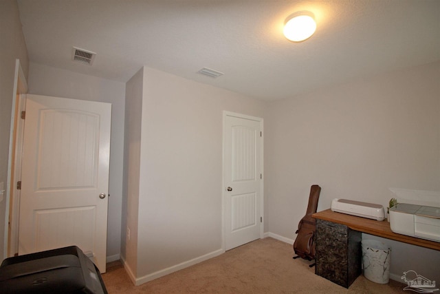 9453 Lutoo Ln, Pensacola, FL 32526 - bedroom featuring light colored carpet, a desk, and baseboards