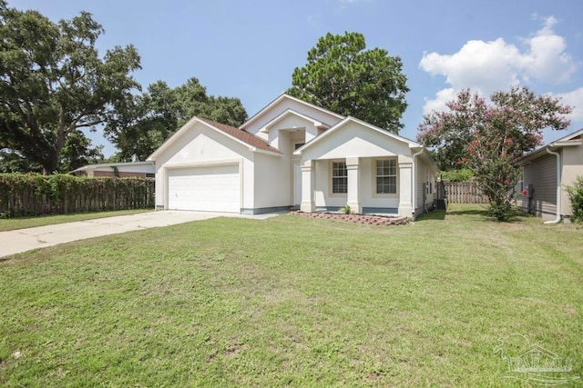 ranch-style house featuring a front yard and a garage