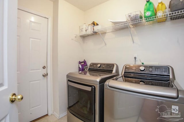 laundry area featuring independent washer and dryer