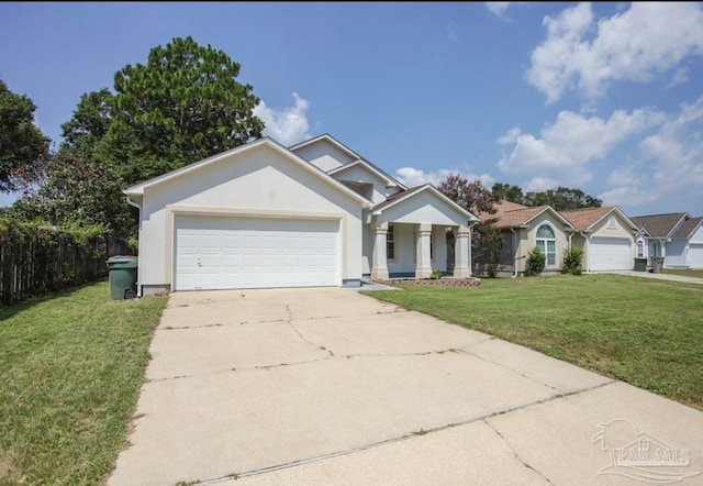 view of front of house with a front lawn and a garage