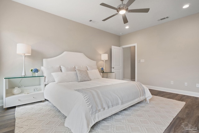 bedroom with ceiling fan and light wood-type flooring