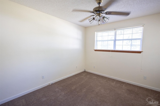 carpeted empty room featuring a textured ceiling and ceiling fan