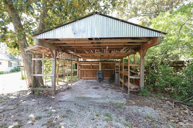 view of parking / parking lot with a carport