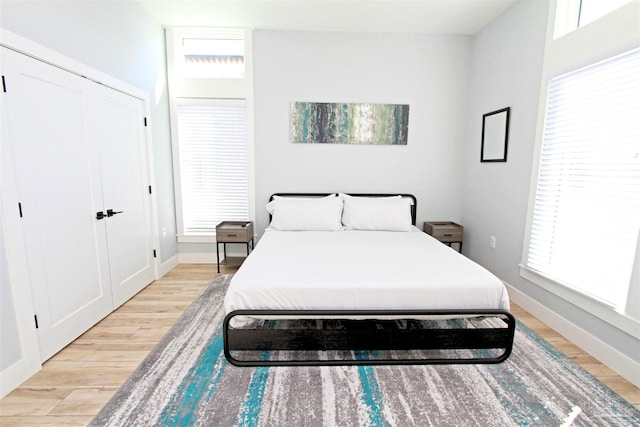 157 S Spring St, Pensacola, FL 32502 - bedroom featuring light wood-style floors and baseboards