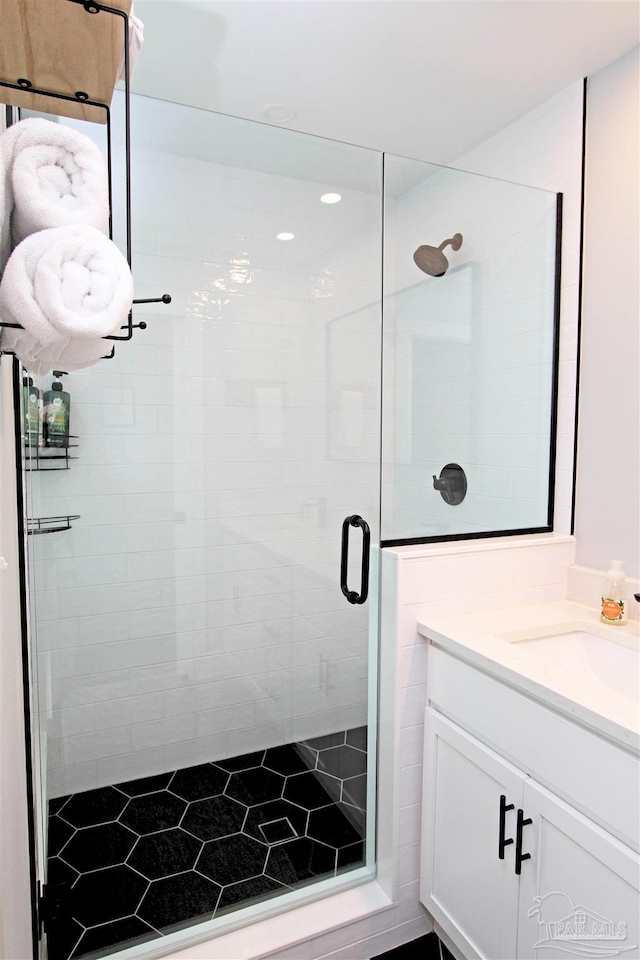 157 S Spring St, Pensacola, FL 32502 - bathroom featuring a shower stall and vanity