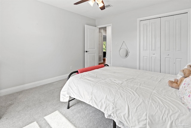 bedroom featuring carpet flooring, ceiling fan, and a closet