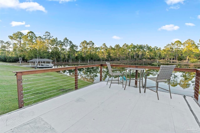 view of patio / terrace featuring a water view