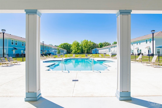 view of swimming pool featuring a patio