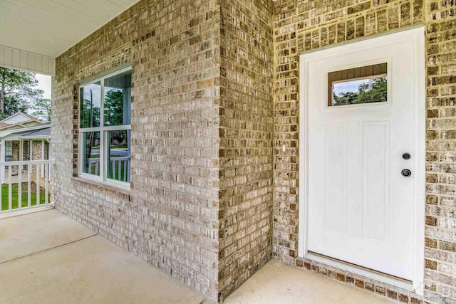 property entrance with a porch