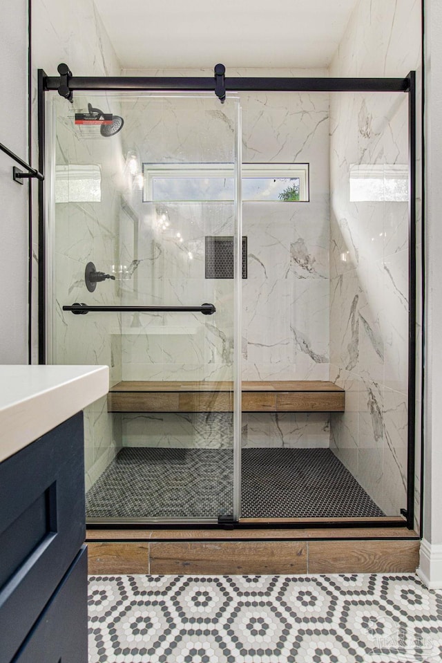 bathroom with vanity and an enclosed shower