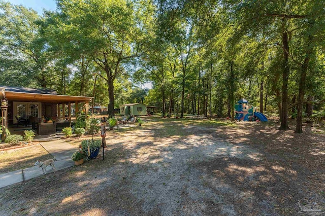 view of yard with a playground