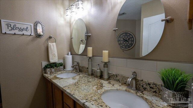 1462 Camrose Pl, Pensacola, FL 32534 - full bath featuring double vanity and decorative backsplash