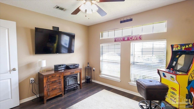 1462 Camrose Pl, Pensacola, FL 32534 - office with baseboards, ceiling fan, and dark wood-style floors