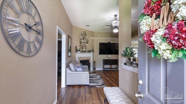 1462 Camrose Pl, Pensacola, FL 32534 - entrance foyer featuring a ceiling fan, wood finished floors, a fireplace, and baseboards