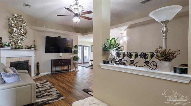 1462 Camrose Pl, Pensacola, FL 32534 - living room with ceiling fan, wood finished floors, and a fireplace