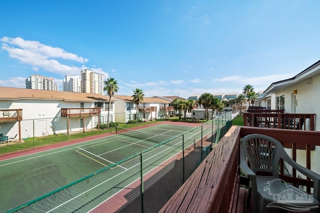 8425 Gulf Blvd Unit 206, Navarre Beach, FL 32566 - view of sport court featuring a residential view and fence